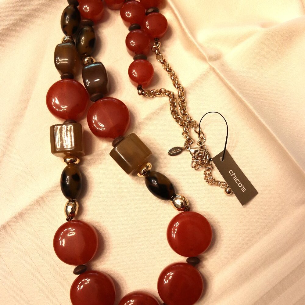 Statenment necklace in  heavy cognac, brown and gold!!